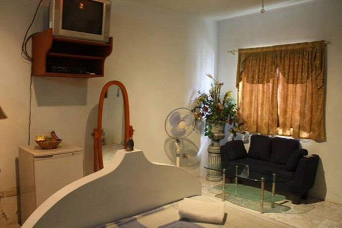 Imagen de la habitación del Hotel Kokomos Beach Resort. Foto 11