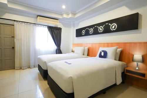Imagen de la habitación del Hotel Kokotel Pattaya North Beach. Foto 19