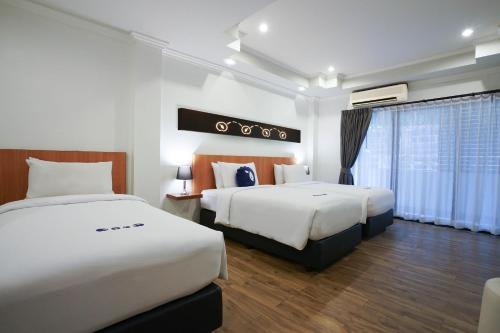 Imagen de la habitación del Hotel Kokotel Pattaya North Beach. Foto 20