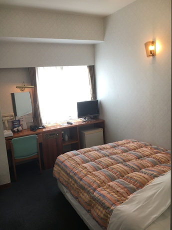 Imagen de la habitación del Hotel Kokusai Plaza. Foto 9
