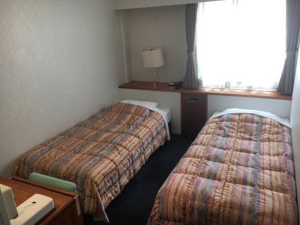 Imagen de la habitación del Hotel Kokusai Plaza. Foto 11