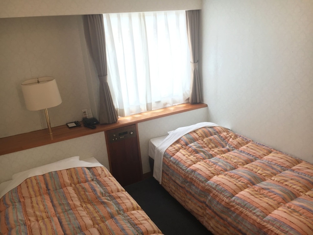 Imagen de la habitación del Hotel Kokusai Plaza. Foto 12