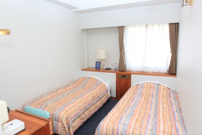 Imagen de la habitación del Hotel Kokusai Plaza. Foto 13