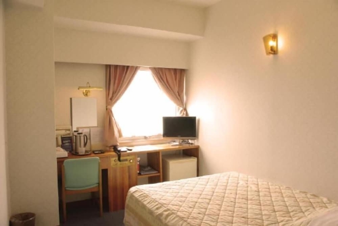 Imagen de la habitación del Hotel Kokusai Plaza. Foto 15