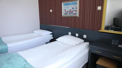 Imagen de la habitación del Hotel Kolağası otel. Foto 11