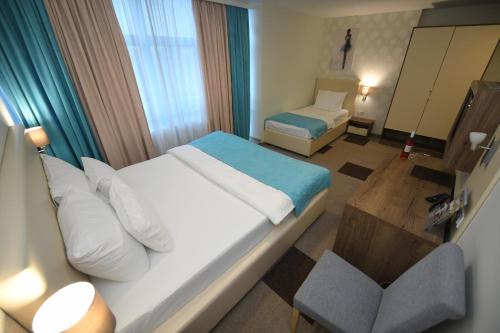 Imagen de la habitación del Hotel Kole. Foto 18