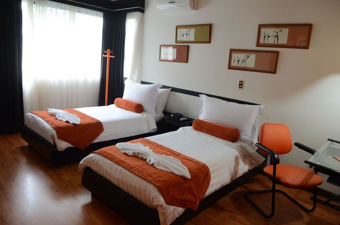 Imagen de la habitación del Hotel Kolor Boutique. Foto 11