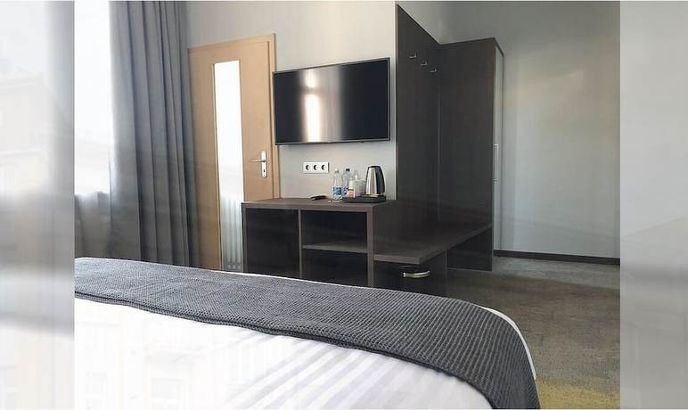 Imagen de la habitación del Hotel Kolumbs. Foto 9