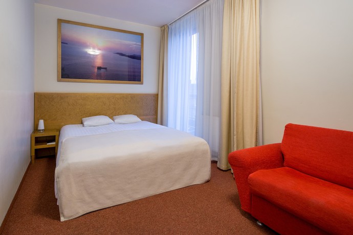 Imagen de la habitación del Hotel Kolumbs. Foto 17