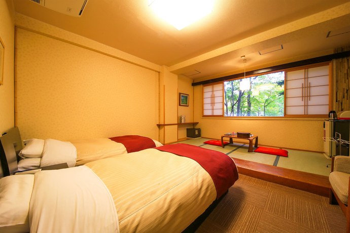 Imagen de la habitación del Hotel Komagatake Grand. Foto 14