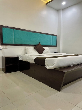 Imagen de la habitación del Hotel Komal Palace. Foto 7