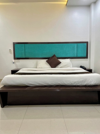 Imagen de la habitación del Hotel Komal Palace. Foto 8