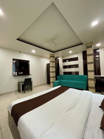 Imagen de la habitación del Hotel Komal Palace. Foto 11