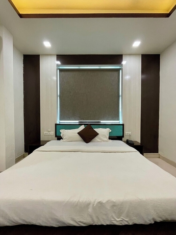 Imagen de la habitación del Hotel Komal Palace. Foto 12