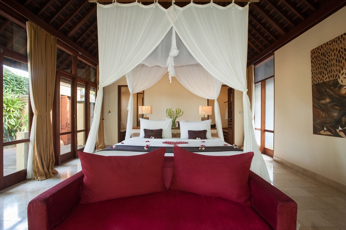 Imagen de la habitación del Hotel Komaneka At Tanggayuda. Foto 4