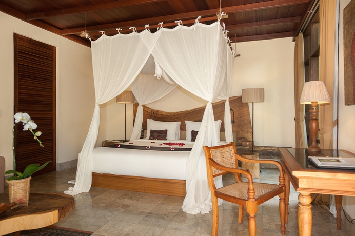 Imagen de la habitación del Hotel Komaneka At Tanggayuda. Foto 8