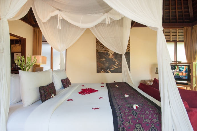 Imagen de la habitación del Hotel Komaneka At Tanggayuda. Foto 9