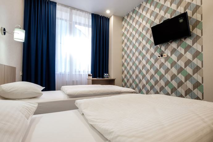 Imagen de la habitación del Hotel Komatek. Foto 11