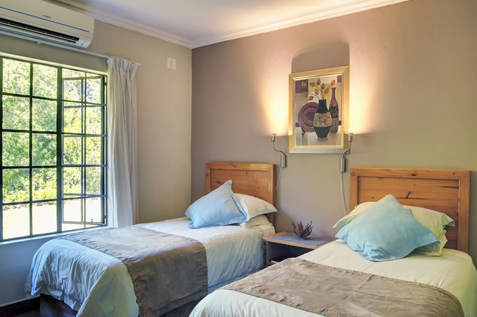 Imagen de la habitación del Hotel Komati River Chalets. Foto 3