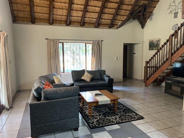 Imagen de la habitación del Hotel Komati River Chalets. Foto 4