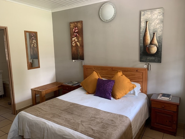 Imagen de la habitación del Hotel Komati River Chalets. Foto 5