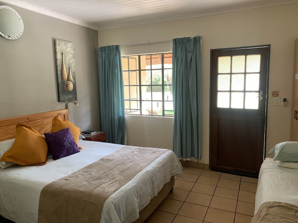 Imagen de la habitación del Hotel Komati River Chalets. Foto 6