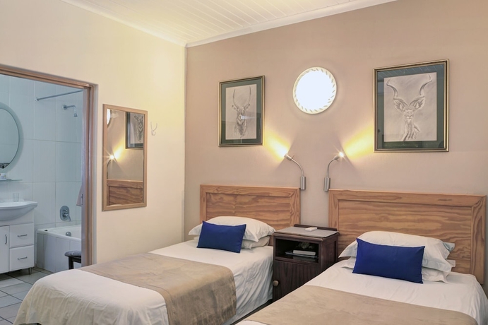 Imagen de la habitación del Hotel Komati River Chalets. Foto 9