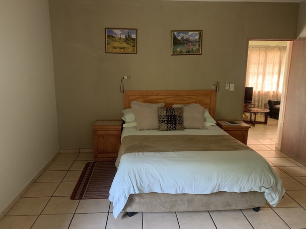 Imagen de la habitación del Hotel Komati River Chalets. Foto 11