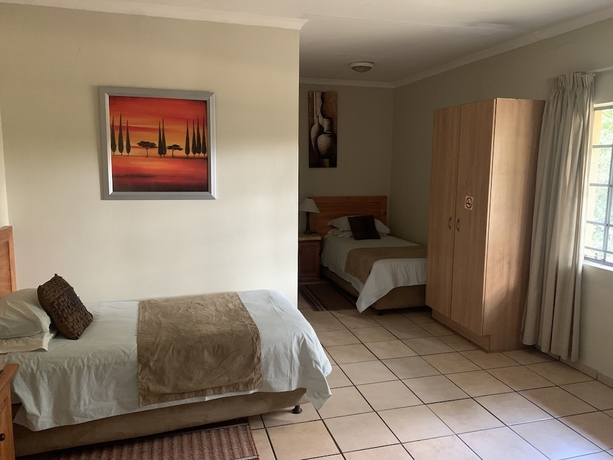 Imagen de la habitación del Hotel Komati River Chalets. Foto 12