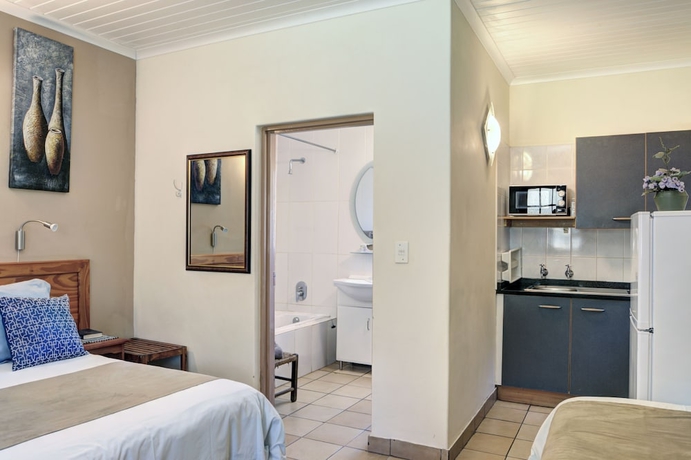 Imagen de la habitación del Hotel Komati River Chalets. Foto 13