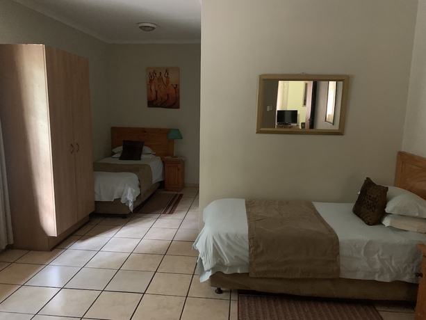 Imagen de la habitación del Hotel Komati River Chalets. Foto 16