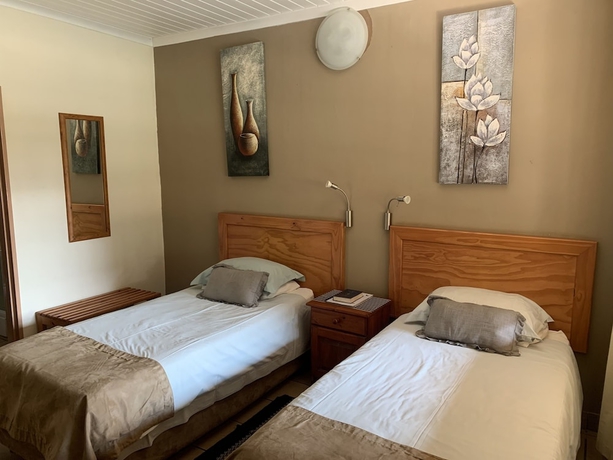 Imagen de la habitación del Hotel Komati River Chalets. Foto 17