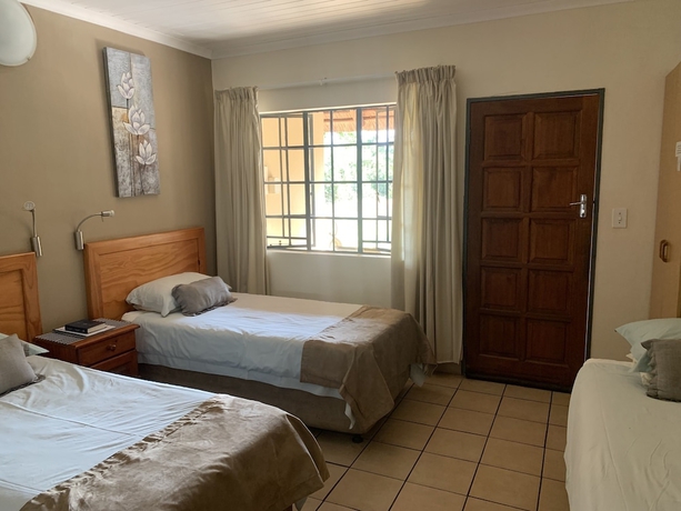 Imagen de la habitación del Hotel Komati River Chalets. Foto 18