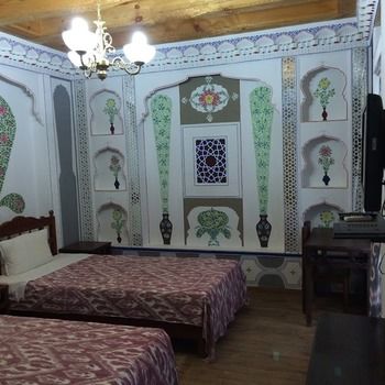 Imagen de la habitación del Hotel Komil Bukhara Boutique. Foto 11