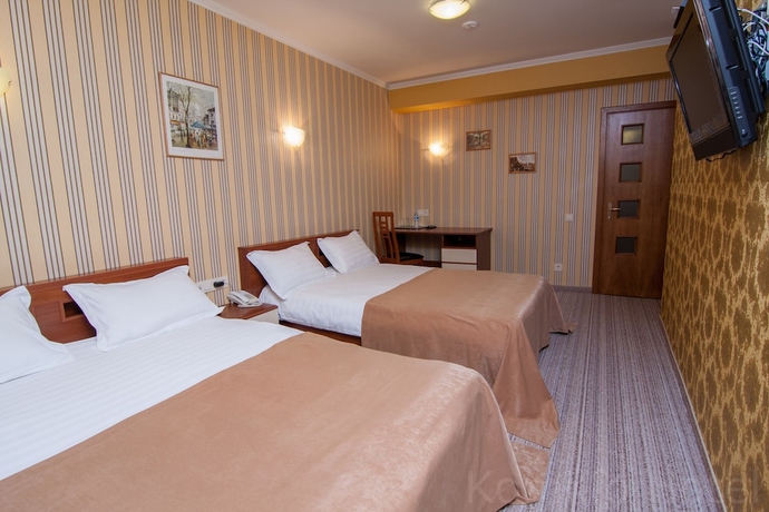 Imagen de la habitación del Hotel Komilfo. Foto 11