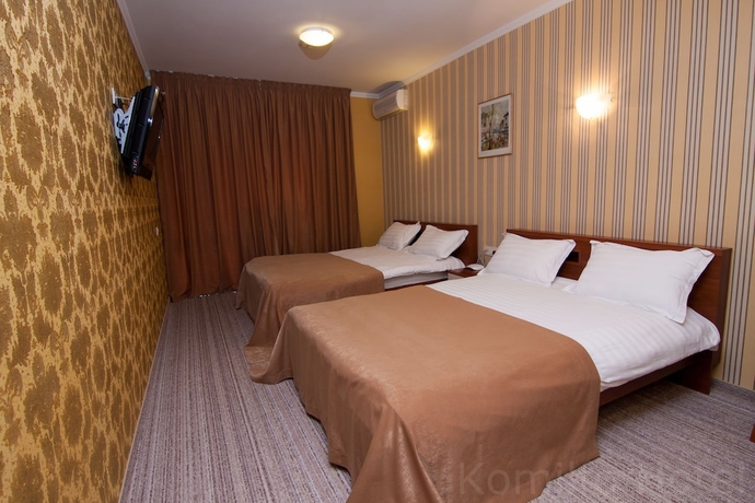 Imagen de la habitación del Hotel Komilfo. Foto 12