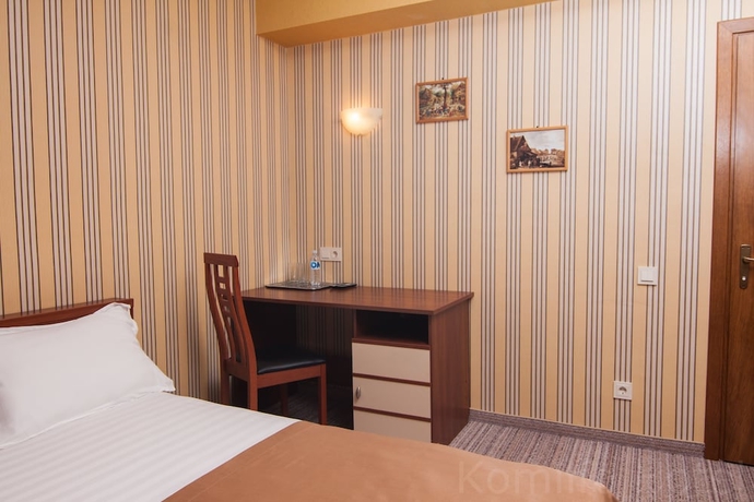 Imagen de la habitación del Hotel Komilfo. Foto 14