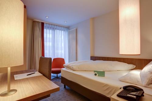 Imagen de la habitación del Hotel Kommerzhotel Köln. Foto 8