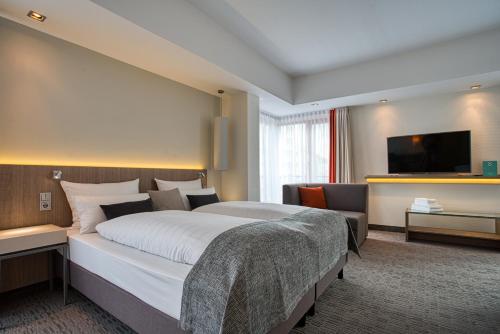 Imagen de la habitación del Hotel Kommerzhotel Köln. Foto 9