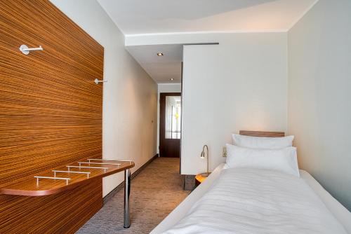 Imagen de la habitación del Hotel Kommerzhotel Köln. Foto 10