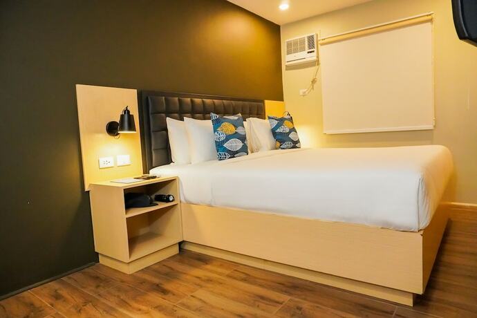 Imagen de la habitación del Hotel Kommons by Kamino. Foto 19