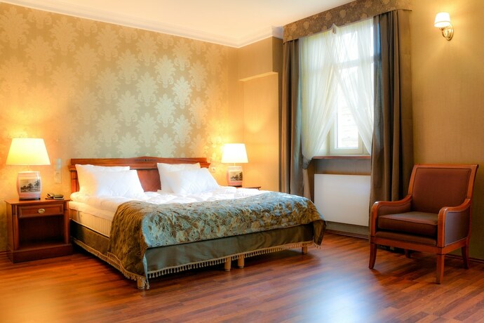 Imagen de la habitación del Hotel Komoda Club Residence. Foto 13