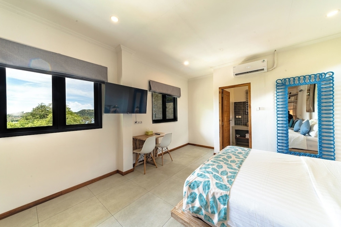 Imagen de la habitación del Hotel Komodo Suites Downtown. Foto 4