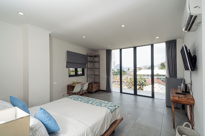 Imagen de la habitación del Hotel Komodo Suites Downtown. Foto 6