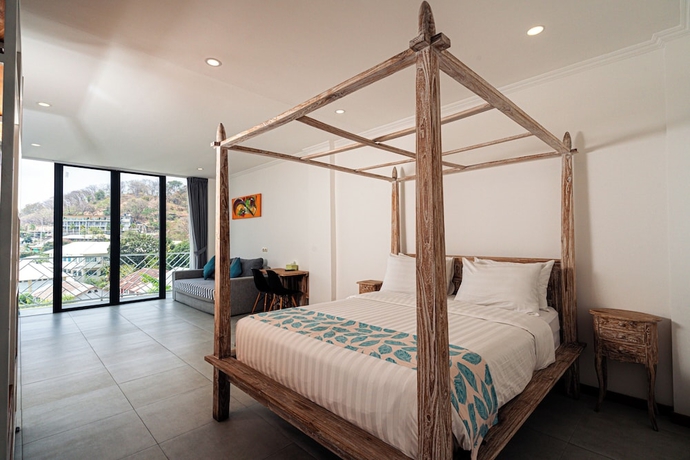 Imagen de la habitación del Hotel Komodo Suites Downtown. Foto 7