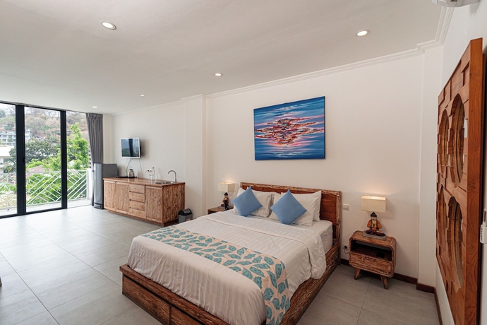 Imagen de la habitación del Hotel Komodo Suites Downtown. Foto 10