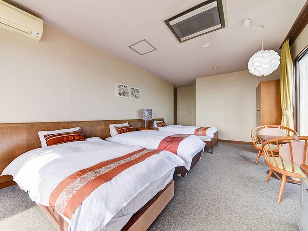 Imagen de la habitación del Hotel Komogakushi Onsen Sanyo Club. Foto 5