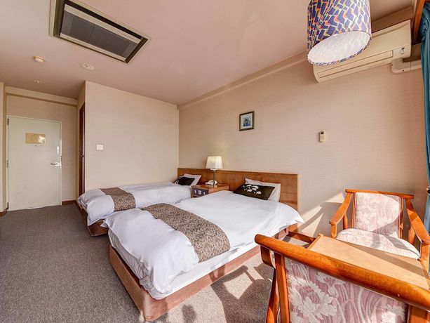 Imagen de la habitación del Hotel Komogakushi Onsen Sanyo Club. Foto 6