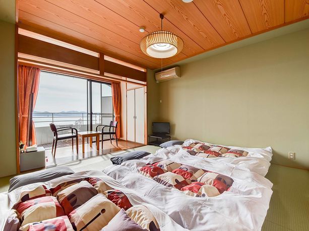 Imagen de la habitación del Hotel Komogakushi Onsen Sanyo Club. Foto 11
