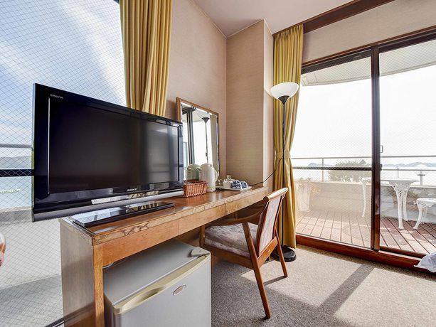 Imagen de la habitación del Hotel Komogakushi Onsen Sanyo Club. Foto 16